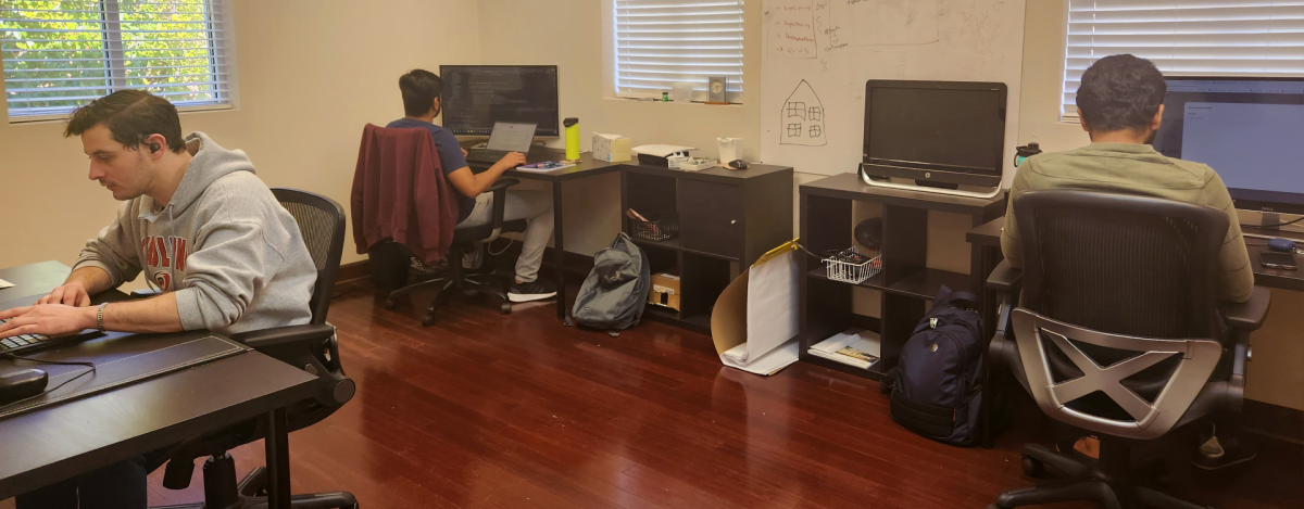Three team members hard at work in the CCX Cary office image